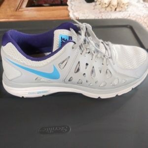 Nike womens athletic shoes...work...no holes, tear